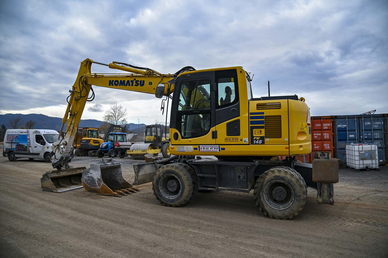 KOMATSU PW148-10 - Máy xúc bánh lốp: hình 3 KOMATSU PW148-10 - Máy xúc bánh lốp: hình 3