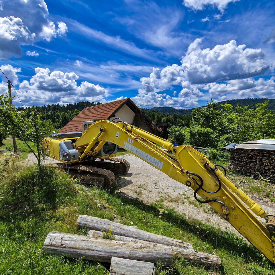 New Holland Kobelco E215 - Máy xúc bánh xích: hình 3 New Holland Kobelco E215 - Máy xúc bánh xích: hình 3