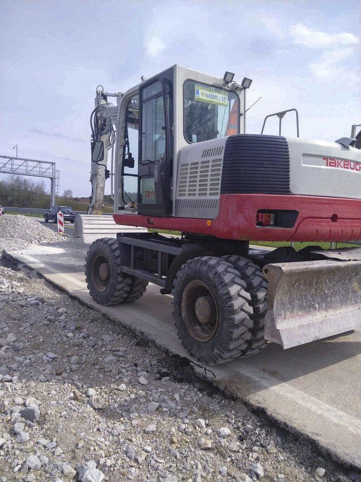 Takeuchi TB1160W - Máy xúc bánh lốp: hình 4 Takeuchi TB1160W - Máy xúc bánh lốp: hình 4