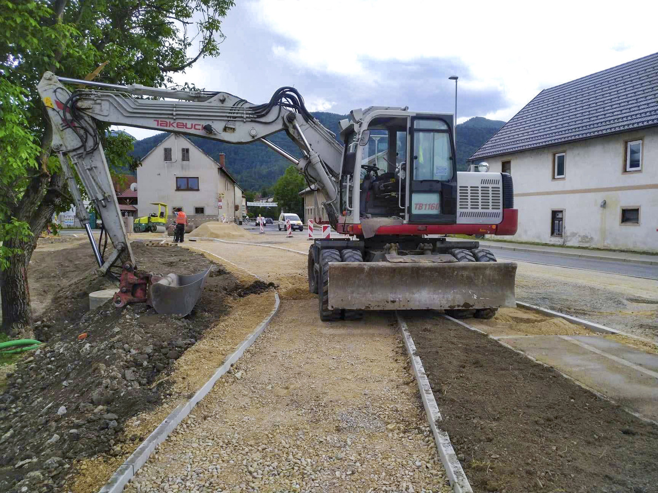 Takeuchi TB1160W - Máy xúc bánh lốp: hình 1 Takeuchi TB1160W - Máy xúc bánh lốp: hình 1