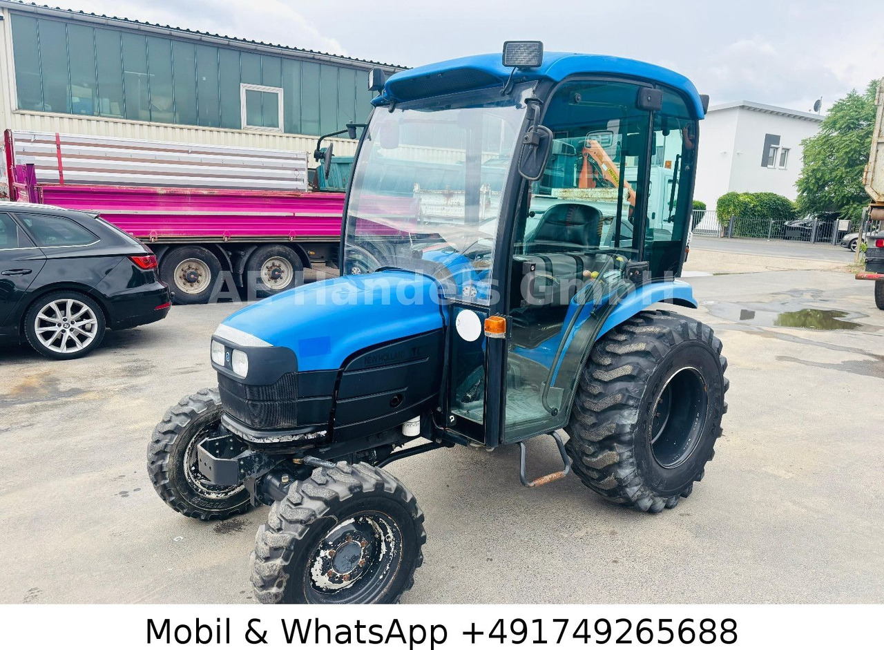 New Holland TC22D Compact Tractor *1500Std./StraßenZulassung - Máy cày: hình 1 New Holland TC22D Compact Tractor *1500Std./StraßenZulassung - Máy cày: hình 1
