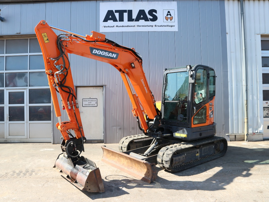 Doosan DX63-3 - Máy xúc mini: hình 1 Doosan DX63-3 - Máy xúc mini: hình 1