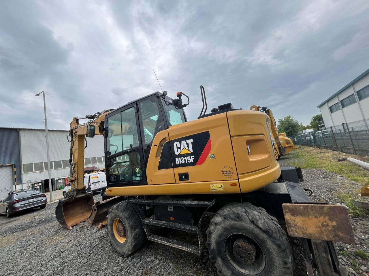 CAT M315F - Máy xúc bánh lốp: hình 4 CAT M315F - Máy xúc bánh lốp: hình 4