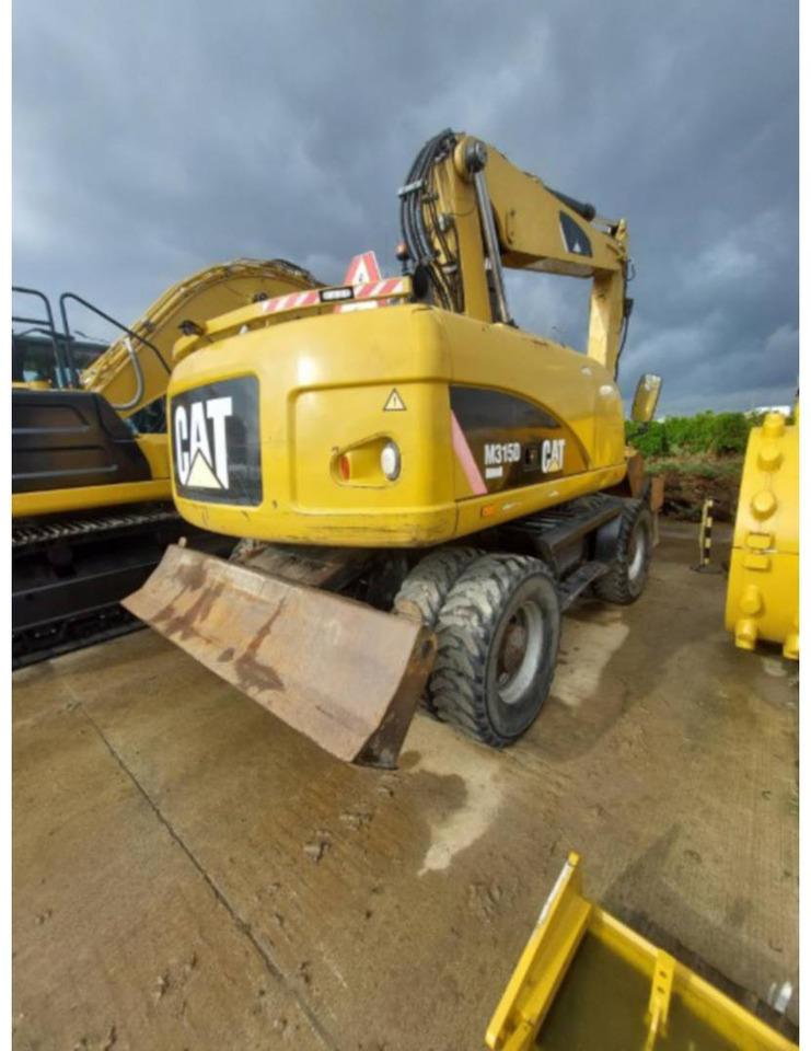 CAT M315D - Máy xúc bánh lốp: hình 3 CAT M315D - Máy xúc bánh lốp: hình 3