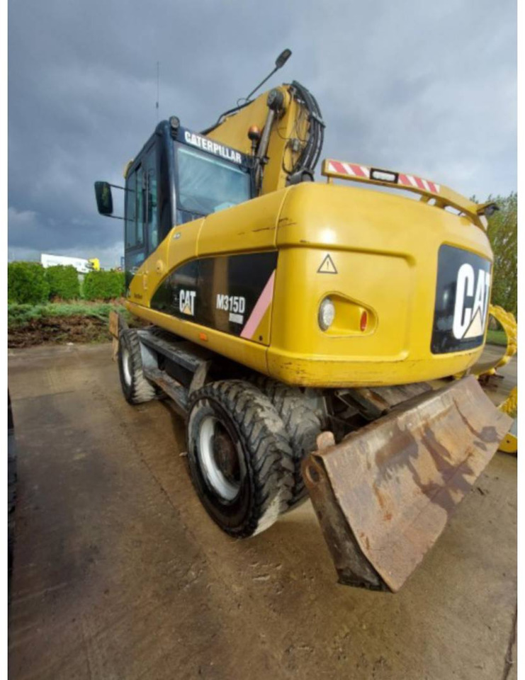 CAT M315D - Máy xúc bánh lốp: hình 4 CAT M315D - Máy xúc bánh lốp: hình 4
