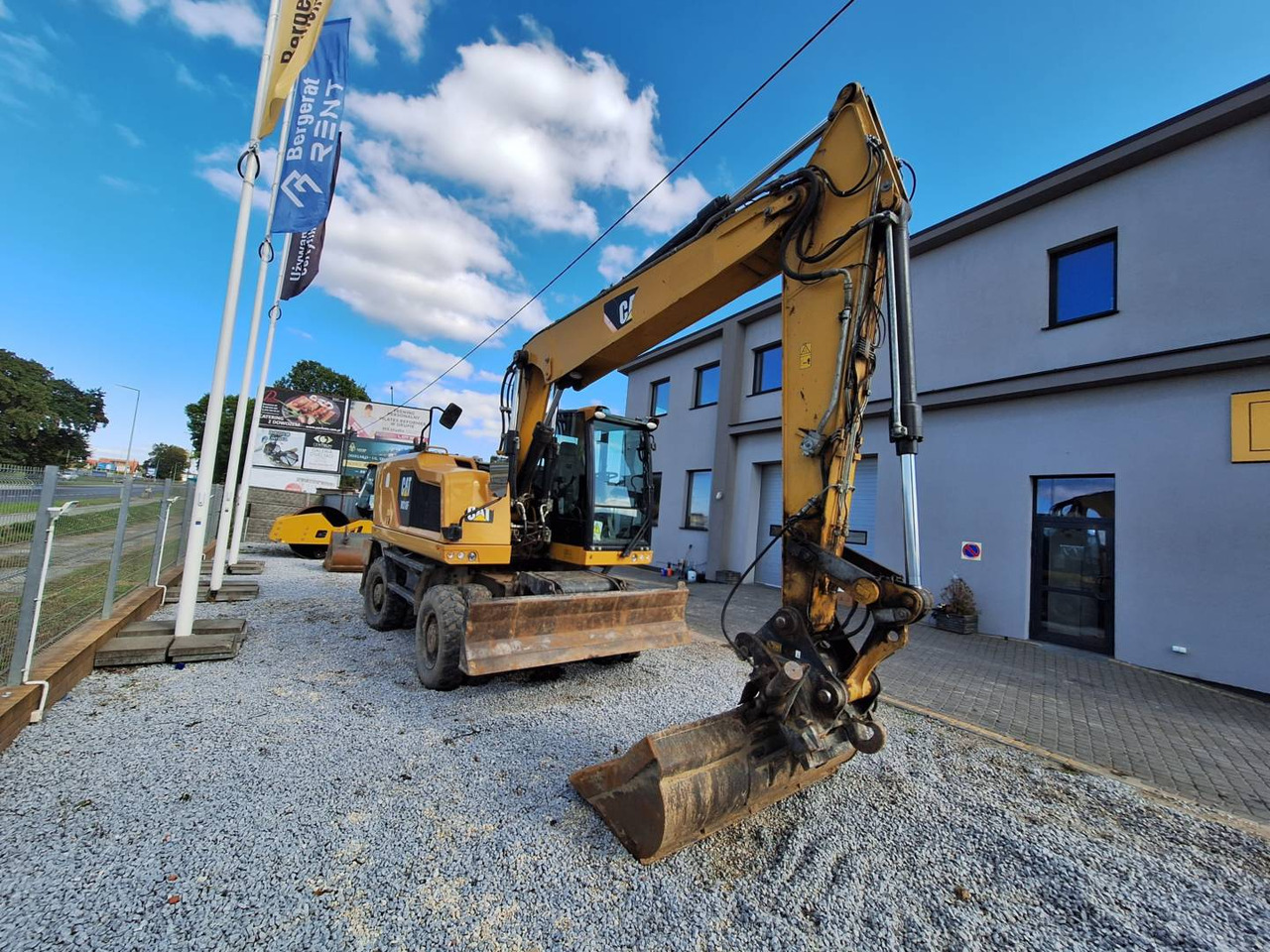 CAT M318F - Máy xúc bánh lốp: hình 2 CAT M318F - Máy xúc bánh lốp: hình 2