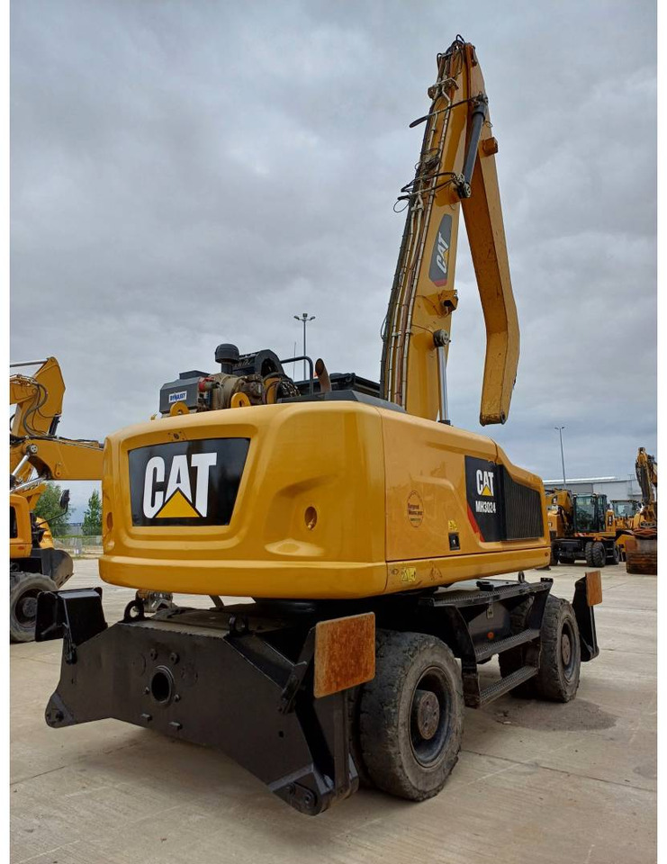 CAT MH3024 - Máy cạp rác/ Công nghiệp: hình 3 CAT MH3024 - Máy cạp rác/ Công nghiệp: hình 3