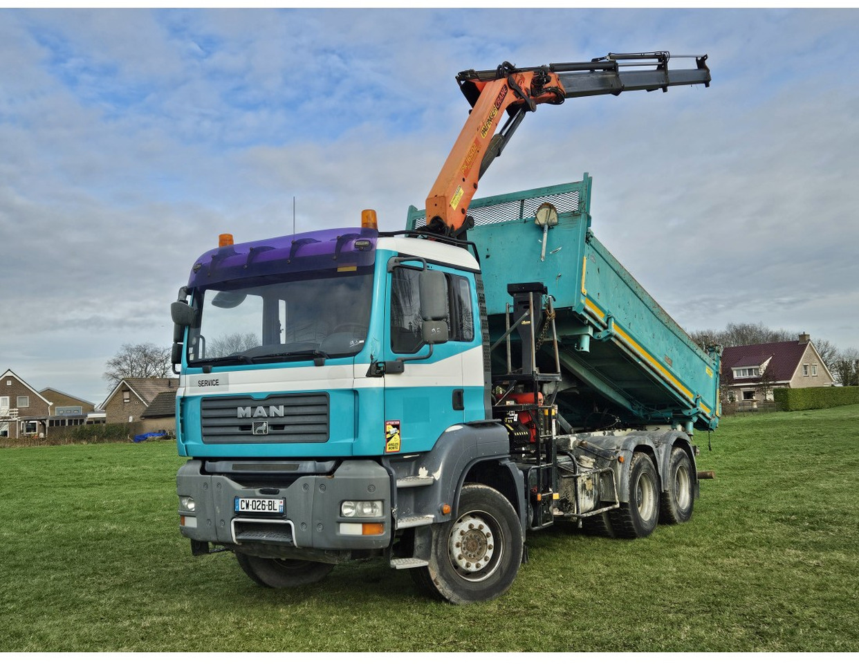 MAN TGA 33.360 TIPPER 3 SIDE CRANE PALFINGER 16502 *REMOTE CONTROL - Xe ben: hình 1 MAN TGA 33.360 TIPPER 3 SIDE CRANE PALFINGER 16502 *REMOTE CONTROL - Xe ben: hình 1