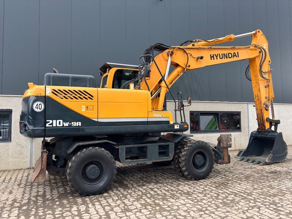 Hyundai Robex 210 W-9 A - 210 W - 200 W - 180 W - Máy xúc bánh lốp: hình 5 Hyundai Robex 210 W-9 A - 210 W - 200 W - 180 W - Máy xúc bánh lốp: hình 5