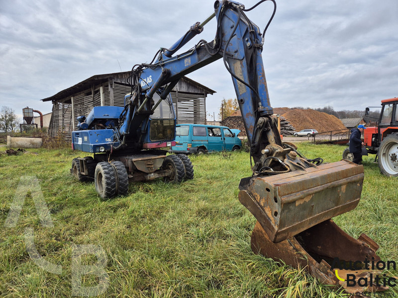 Atlas 1304 - Máy xúc bánh lốp: hình 2 Atlas 1304 - Máy xúc bánh lốp: hình 2