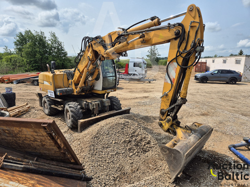 Liebherr A 316 Litronic - Máy xúc bánh lốp: hình 2 Liebherr A 316 Litronic - Máy xúc bánh lốp: hình 2