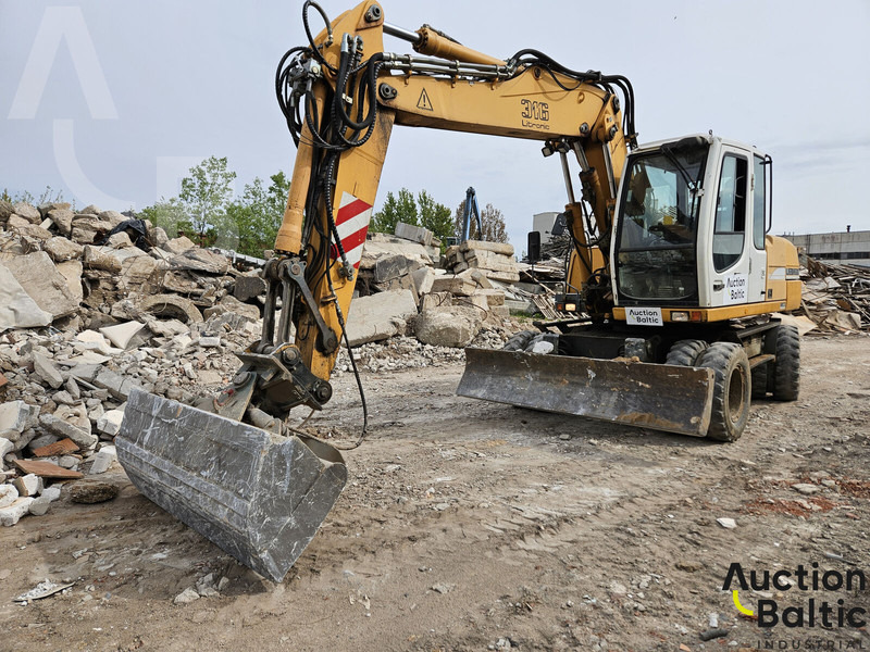 Liebherr A 316 Litronic - Máy xúc bánh lốp: hình 1 Liebherr A 316 Litronic - Máy xúc bánh lốp: hình 1