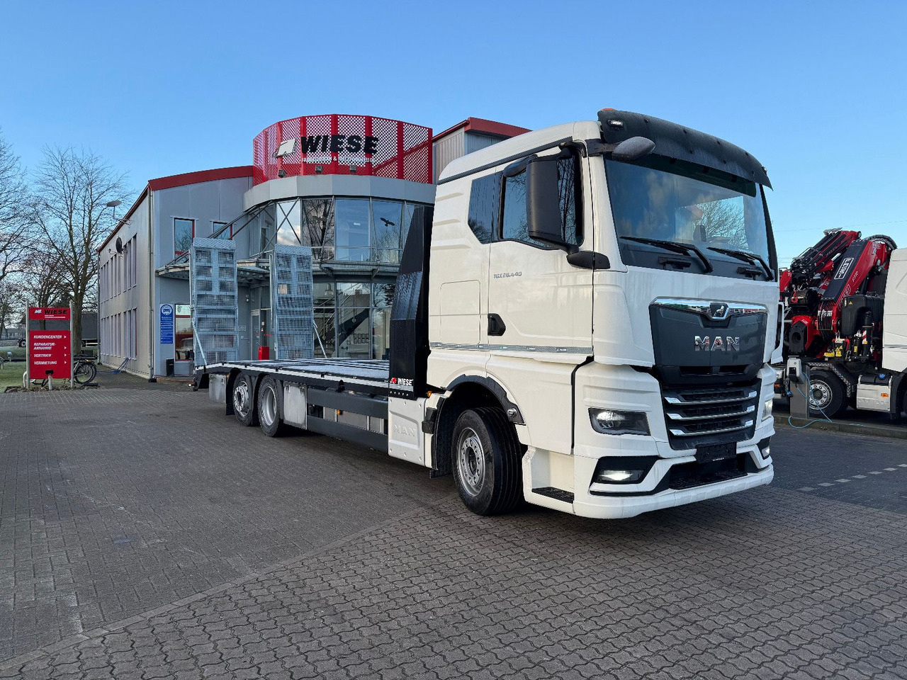 MAN Baumaschinen- Arbeitsbühnentransporter Rampen - Xe tải chuyên chở tự động: hình 2 MAN Baumaschinen- Arbeitsbühnentransporter Rampen - Xe tải chuyên chở tự động: hình 2