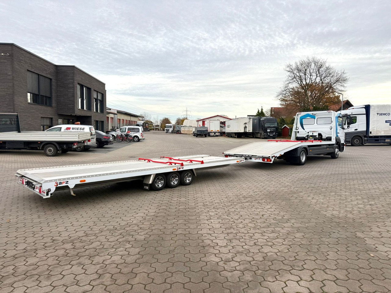 Mercedes-Benz Atego 918L Autotransporter mit BFZ Anhänger - Xe tải chuyên chở tự động: hình 5 Mercedes-Benz Atego 918L Autotransporter mit BFZ Anhänger - Xe tải chuyên chở tự động: hình 5