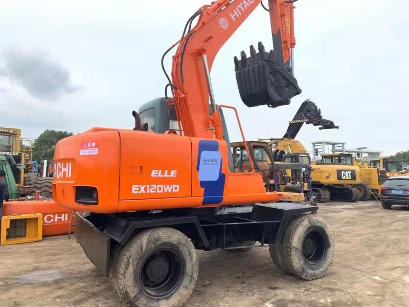HITACHI EX120WD - Máy xúc bánh lốp: hình 1 HITACHI EX120WD - Máy xúc bánh lốp: hình 1