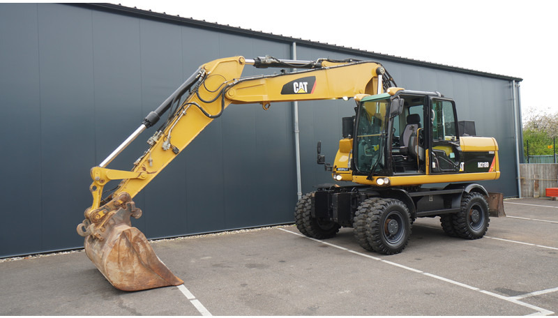 Caterpillar M318D 4X4 WHEELED EXCAVATOR - Máy móc xây dựng: hình 3 Caterpillar M318D 4X4 WHEELED EXCAVATOR - Máy móc xây dựng: hình 3