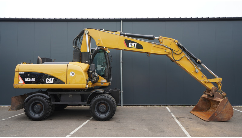 Caterpillar M318D 4X4 WHEELED EXCAVATOR - Máy móc xây dựng: hình 2 Caterpillar M318D 4X4 WHEELED EXCAVATOR - Máy móc xây dựng: hình 2