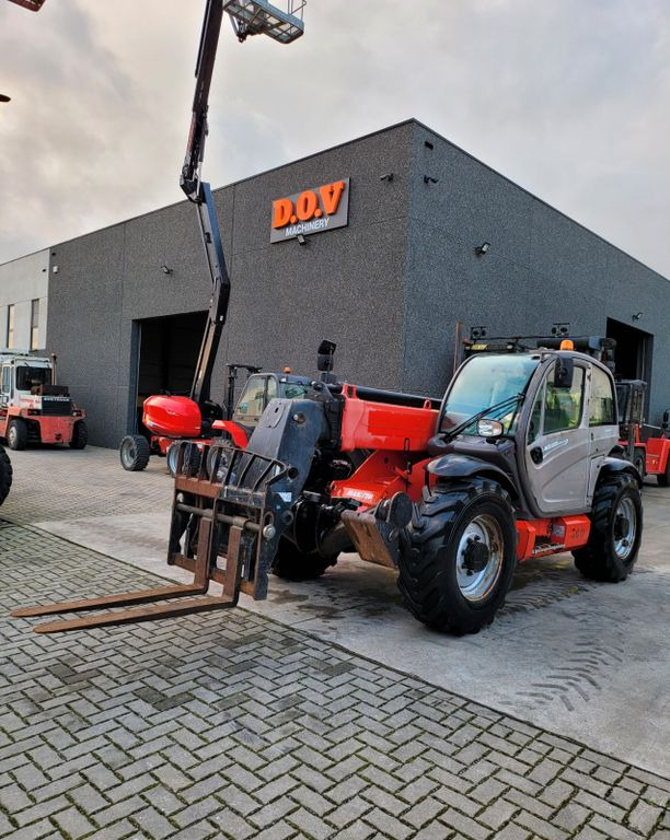 Manitou MT 1135 - Xe nhấc hình viễn vọng kính: hình 1 Manitou MT 1135 - Xe nhấc hình viễn vọng kính: hình 1