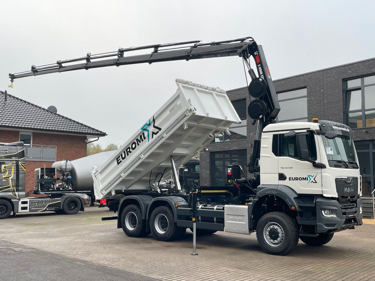 MAN TGS 33.440 6x6 /3-Seiten- Kipper / HIAB 228-6 - Xe ben, Xe cẩu tự hành: hình 1 MAN TGS 33.440 6x6 /3-Seiten- Kipper / HIAB 228-6 - Xe ben, Xe cẩu tự hành: hình 1