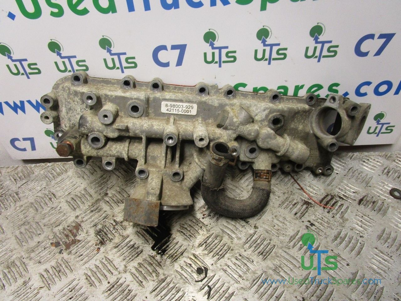 ISUZU NKR (4JJ1) OIL COOLER AND FILTER HOUSING P/NO 898003929 - Động cơ và các bộ phận cho Xe tải: hình 1 ISUZU NKR (4JJ1) OIL COOLER AND FILTER HOUSING P/NO 898003929 - Động cơ và các bộ phận cho Xe tải: hình 1