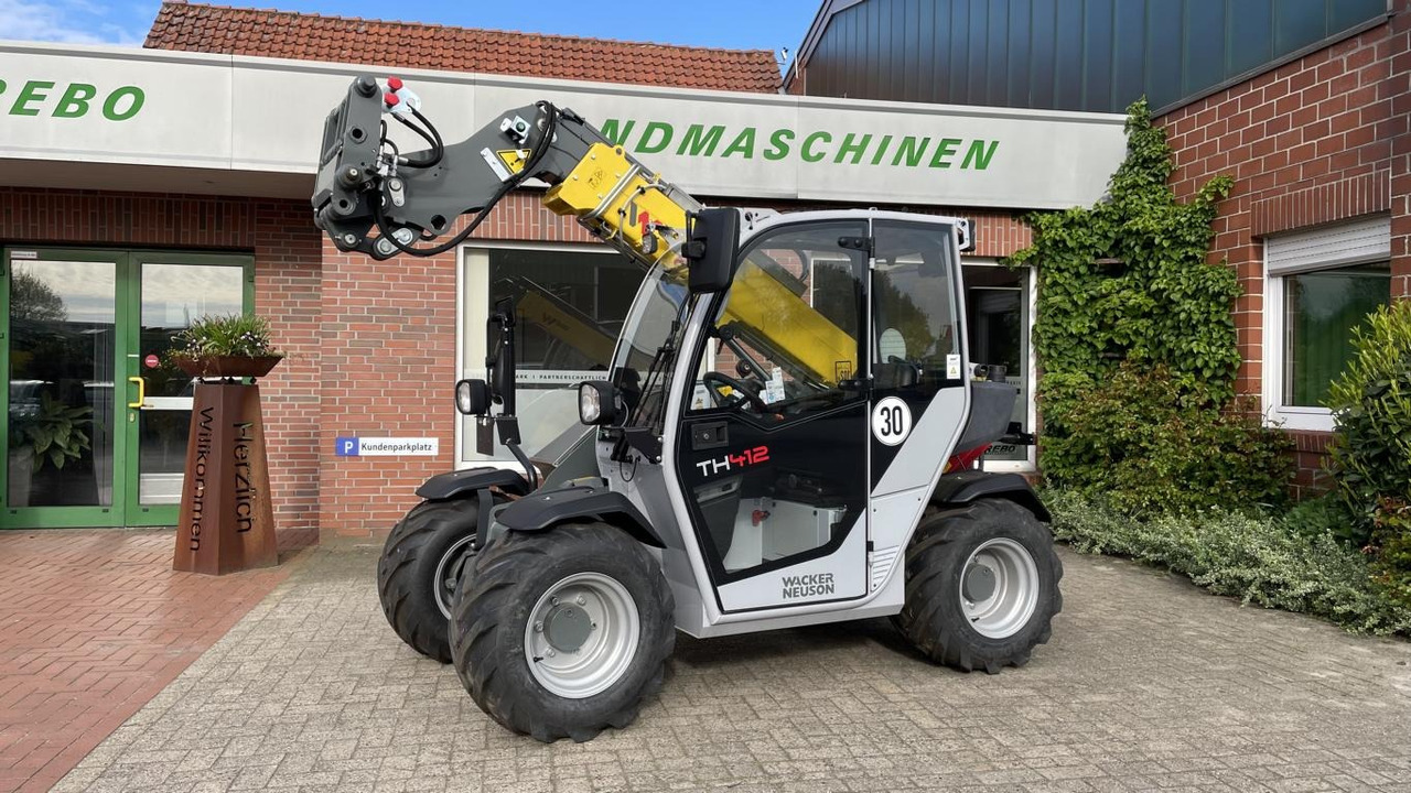 Wacker TH 412 - Máy xúc lật: hình 1 Wacker TH 412 - Máy xúc lật: hình 1