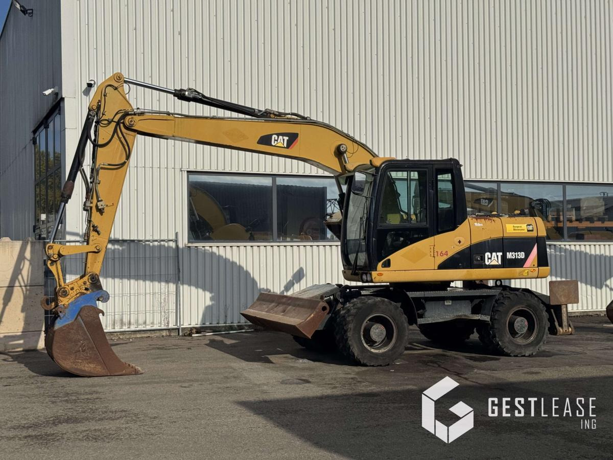 Caterpillar M313D - Máy xúc bánh lốp: hình 1 Caterpillar M313D - Máy xúc bánh lốp: hình 1