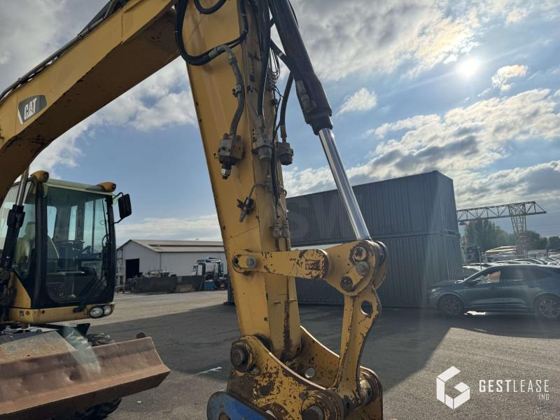 Caterpillar M313D - Máy xúc bánh lốp: hình 5 Caterpillar M313D - Máy xúc bánh lốp: hình 5