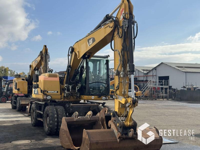Caterpillar M313D - Máy xúc bánh lốp: hình 4 Caterpillar M313D - Máy xúc bánh lốp: hình 4