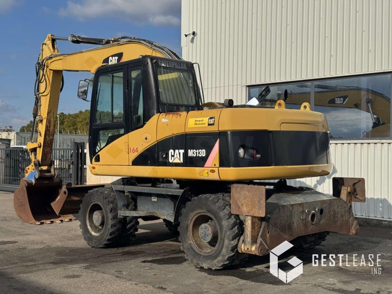 Caterpillar M313D - Máy xúc bánh lốp: hình 2 Caterpillar M313D - Máy xúc bánh lốp: hình 2