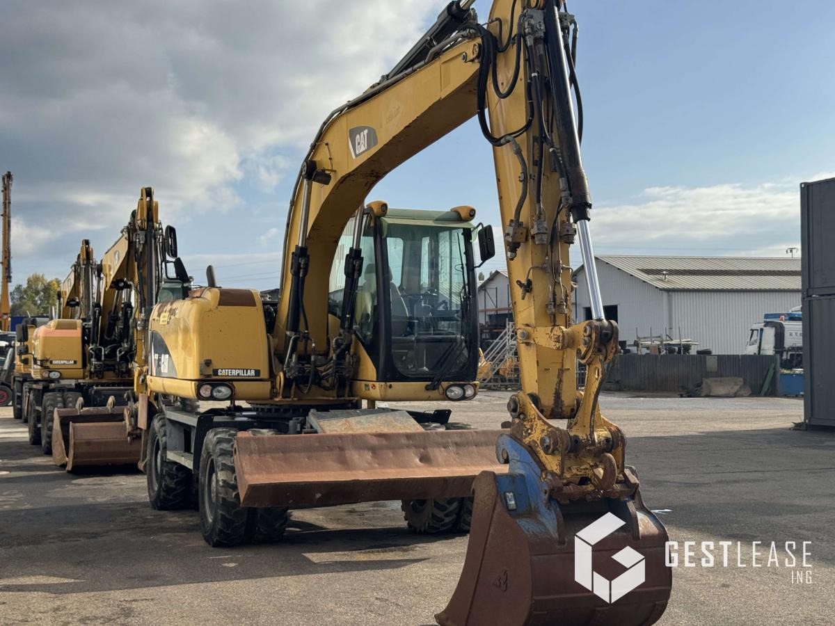 Caterpillar M313D - Máy xúc bánh lốp: hình 4 Caterpillar M313D - Máy xúc bánh lốp: hình 4