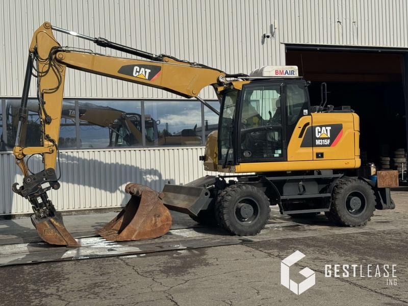 Caterpillar M315F - Máy xúc bánh lốp: hình 1 Caterpillar M315F - Máy xúc bánh lốp: hình 1