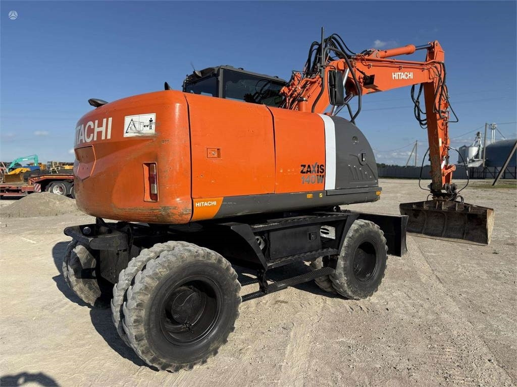 Hitachi ZX 140 W - Máy xúc bánh lốp: hình 4 Hitachi ZX 140 W - Máy xúc bánh lốp: hình 4