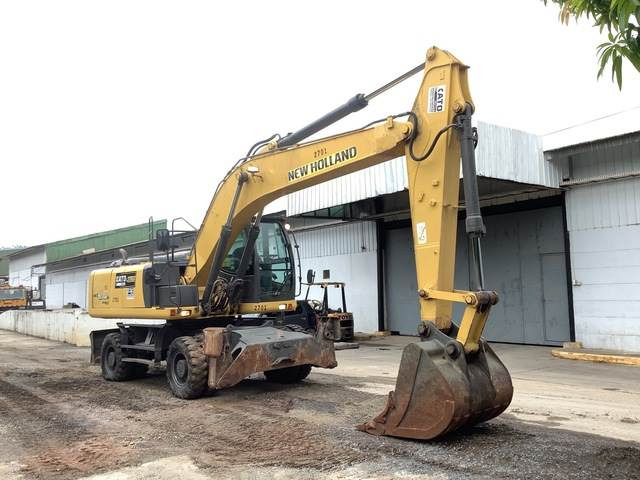 New Holland WE210 - Máy xúc bánh lốp: hình 4 New Holland WE210 - Máy xúc bánh lốp: hình 4