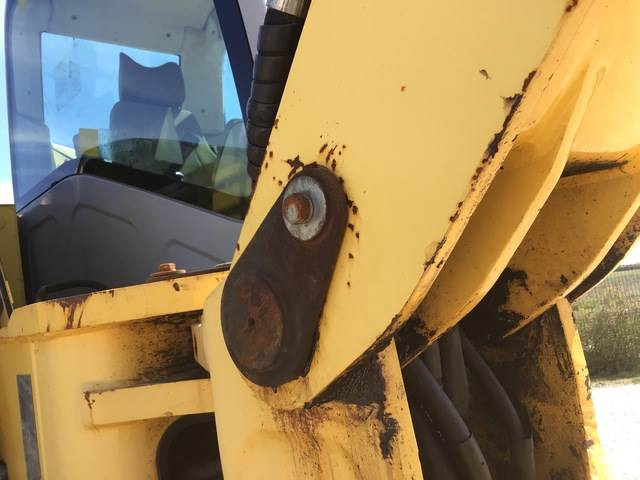 New Holland MH2.6 - Máy xúc bánh lốp: hình 5 New Holland MH2.6 - Máy xúc bánh lốp: hình 5