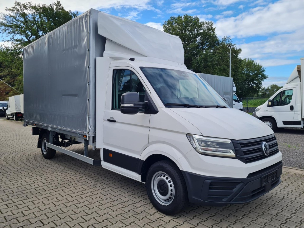 Volkswagen Crafter 35 TDI Pritsche Schiebe Plane ERGO LED TEMPOMAT - Xe van thùng mui bạt: hình 3 Volkswagen Crafter 35 TDI Pritsche Schiebe Plane ERGO LED TEMPOMAT - Xe van thùng mui bạt: hình 3