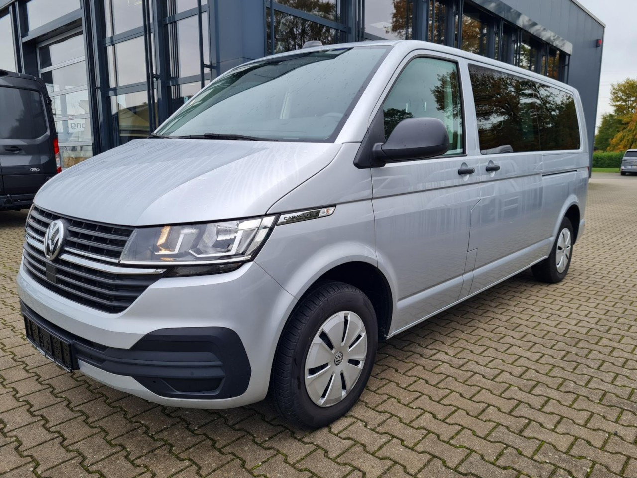 Volkswagen T6.1 Caravelle TDI lang 9 Sitzer 2 Schiebetüren Trendl. - Xe bus mini, Xe van chở khách: hình 1 Volkswagen T6.1 Caravelle TDI lang 9 Sitzer 2 Schiebetüren Trendl. - Xe bus mini, Xe van chở khách: hình 1
