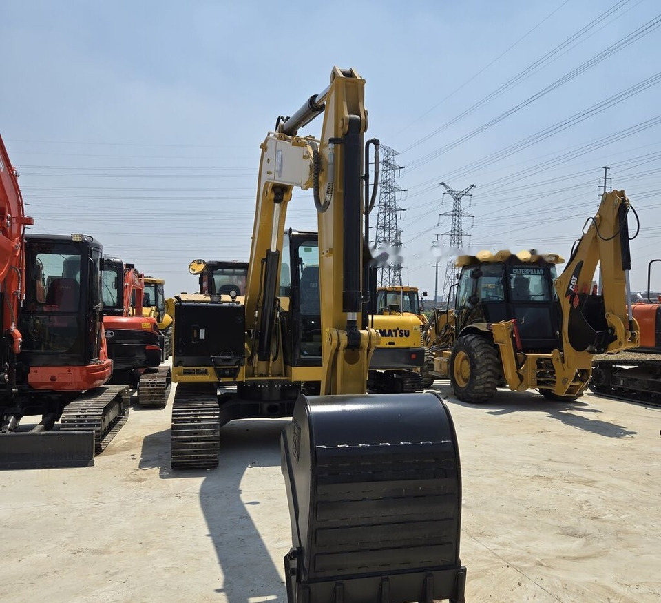 Caterpillar 307.5 - Máy xúc mini: hình 4 Caterpillar 307.5 - Máy xúc mini: hình 4