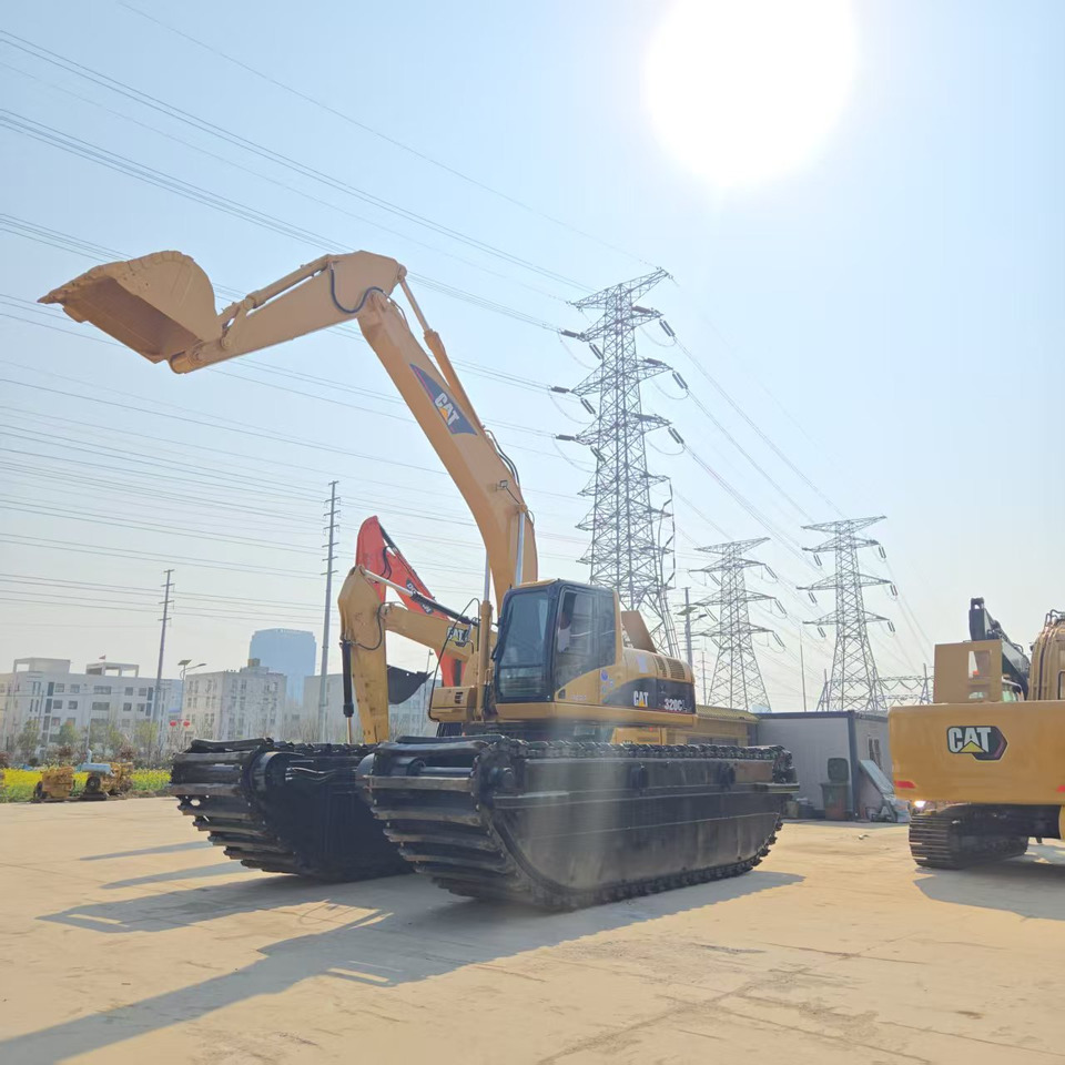 Caterpillar 320C - Máy cạp lưỡng cư: hình 1 Caterpillar 320C - Máy cạp lưỡng cư: hình 1