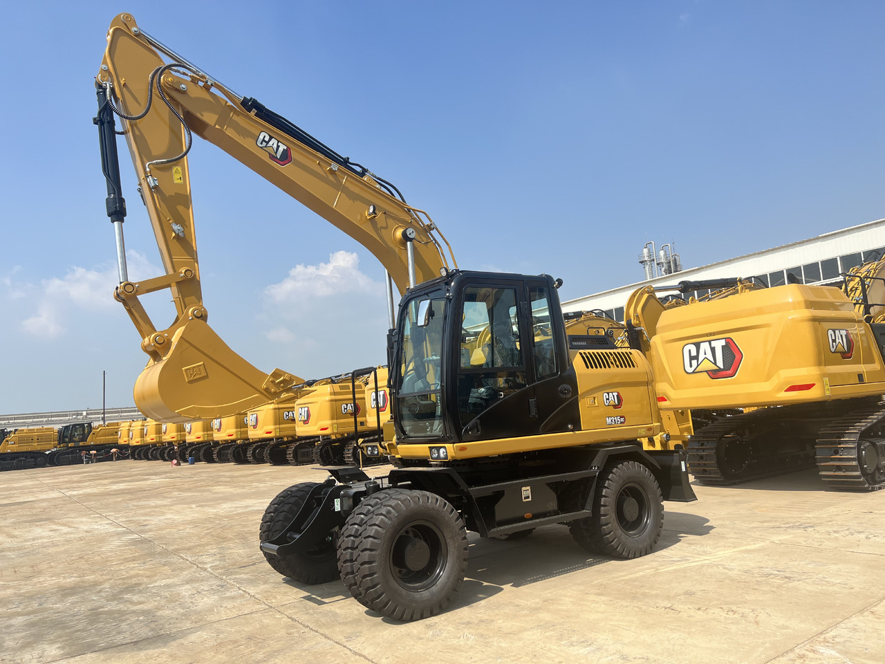 Caterpillar M315GC - Máy xúc bánh lốp: hình 1 Caterpillar M315GC - Máy xúc bánh lốp: hình 1
