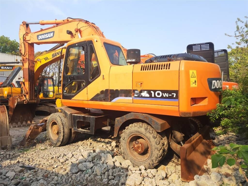 Doosan DH 210 W-7 - Máy xúc bánh lốp: hình 1 Doosan DH 210 W-7 - Máy xúc bánh lốp: hình 1
