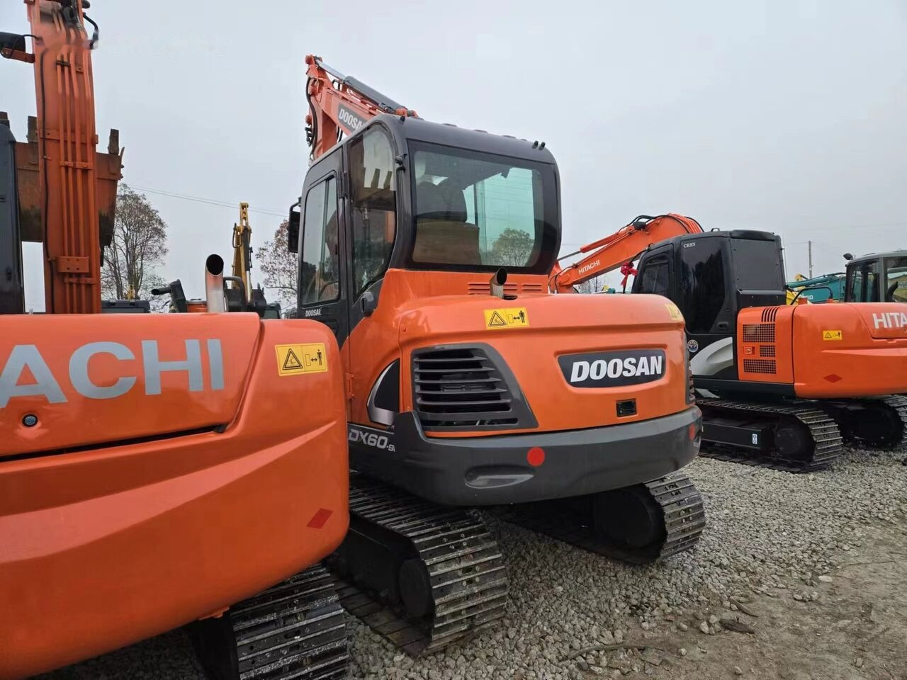 Doosan DX60-9 - Máy xúc bánh xích: hình 3 Doosan DX60-9 - Máy xúc bánh xích: hình 3