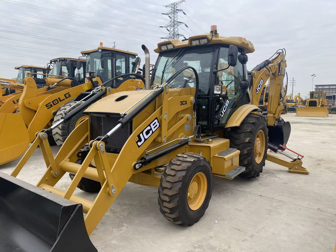 JCB 3CX - Máy xúc trước múc sau: hình 1 JCB 3CX - Máy xúc trước múc sau: hình 1