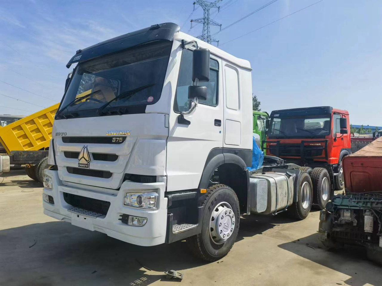 Sinotruk HOWO 375 tractor - Xe ben đổ mini: hình 1 Sinotruk HOWO 375 tractor - Xe ben đổ mini: hình 1