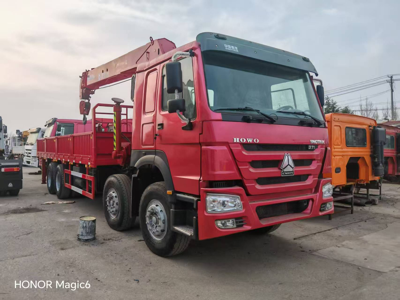 Sinotruk HOWO 8*4 Mobile crane - Cẩu bánh lốp: hình 2 Sinotruk HOWO 8*4 Mobile crane - Cẩu bánh lốp: hình 2