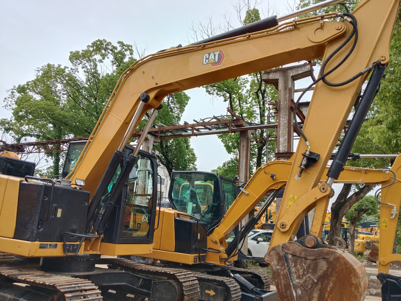 CAT 310 - Máy xúc bánh xích: hình 5 CAT 310 - Máy xúc bánh xích: hình 5