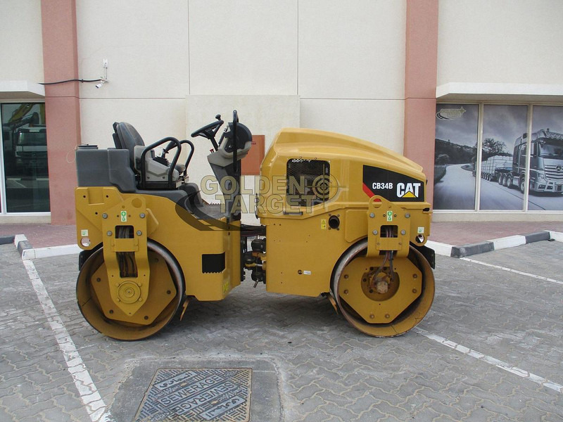 Caterpillar CB34B - Con lăn ruộng: hình 5 Caterpillar CB34B - Con lăn ruộng: hình 5