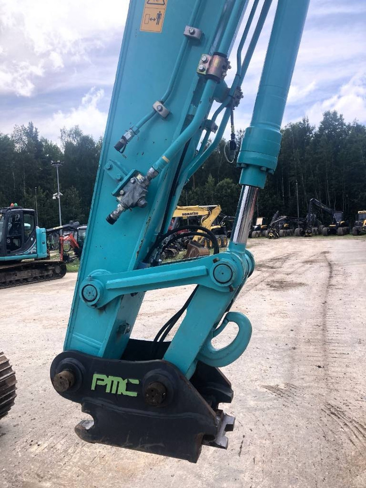 Kobelco SK 140 SRLC-5 - Máy xúc bánh xích: hình 5 Kobelco SK 140 SRLC-5 - Máy xúc bánh xích: hình 5