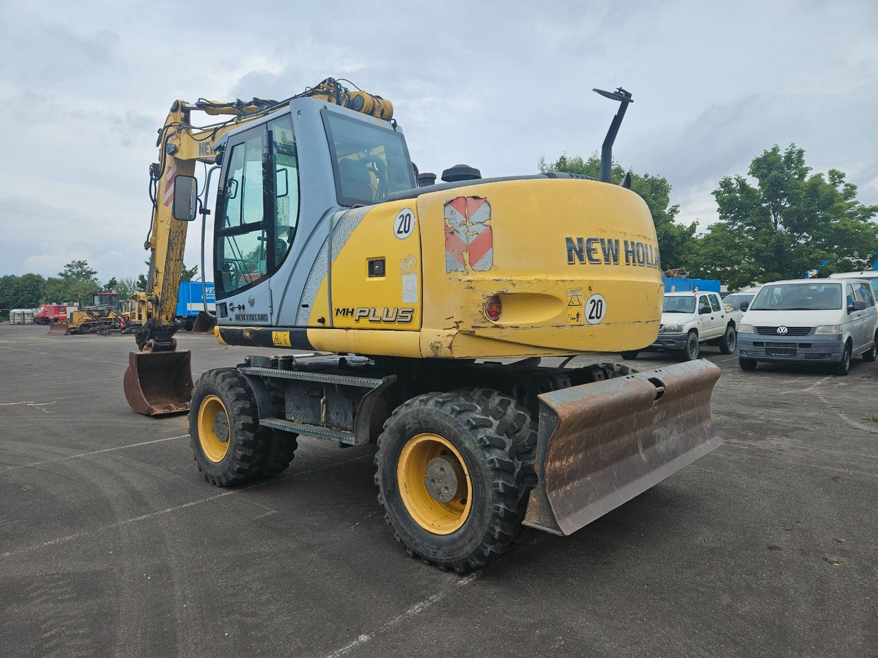 New Holland MH Plus 18t Mobilbagger - Máy xúc bánh lốp: hình 3 New Holland MH Plus 18t Mobilbagger - Máy xúc bánh lốp: hình 3
