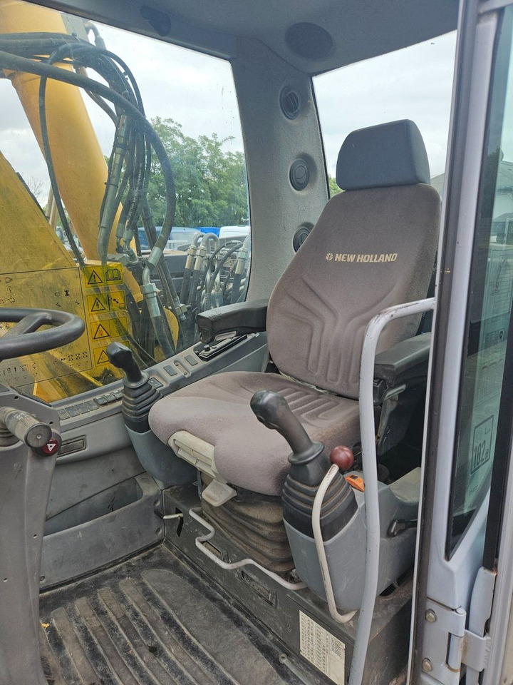New Holland MH Plus 18t Mobilbagger - Máy xúc bánh lốp: hình 5 New Holland MH Plus 18t Mobilbagger - Máy xúc bánh lốp: hình 5