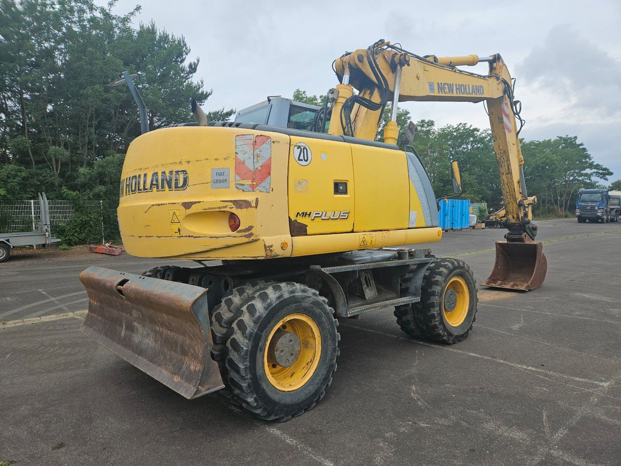 New Holland MH Plus 18t Mobilbagger - Máy xúc bánh lốp: hình 4 New Holland MH Plus 18t Mobilbagger - Máy xúc bánh lốp: hình 4